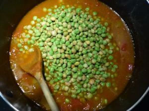 Add the onion and brown, then add the spices, water,tomatoes and frozen peas.